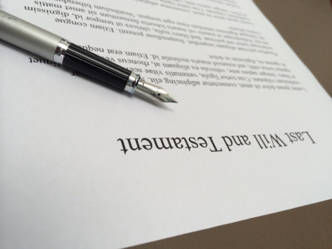 will on desk with pen